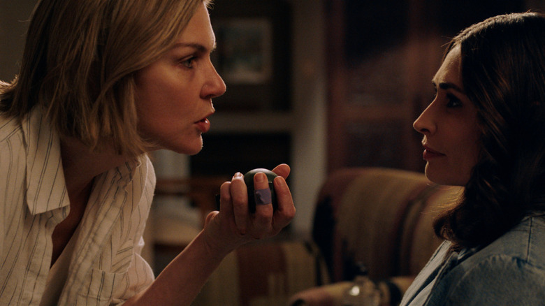 Carol showing a grenade to Zosia on 