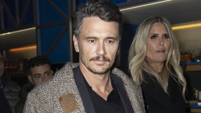 James Franco wearing a heavy coat