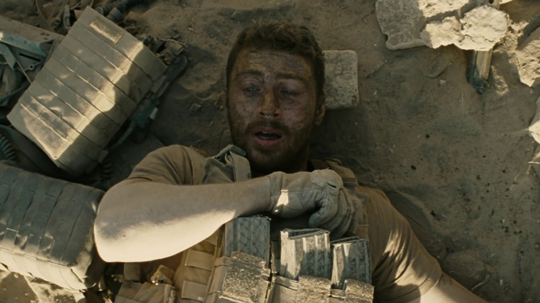 Ize laying on the ground, panicked in The Wall