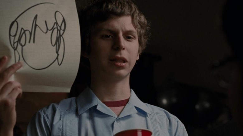 Scott Pilgrim holding paper