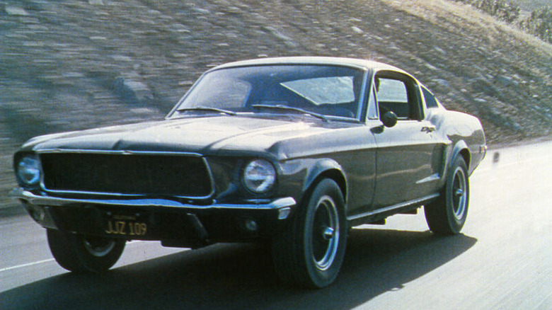 Frank Bullitt driving a green Mustang in Bullitt (1968)