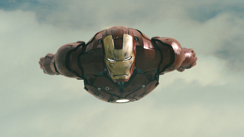 Iron Man soaring through the sky in Iron Man (2008)