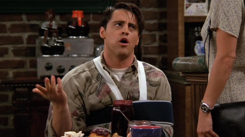 Joey wears a sling