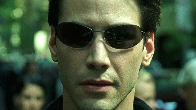 Neo walks through the Matrix