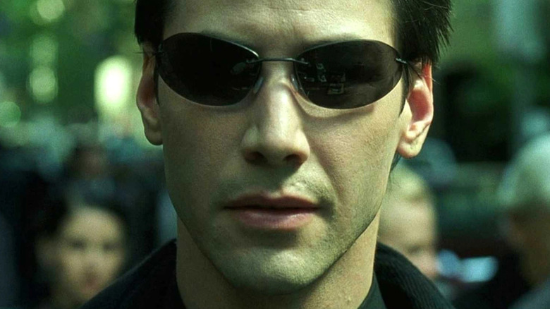 Neo walks through the Matrix