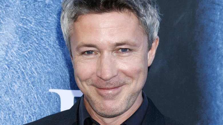 Aiden Gillen smiling