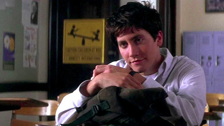 Donnie sitting at a desk in "Donnie Darko"