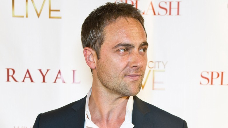 Stuart Townsend looking over shoulder