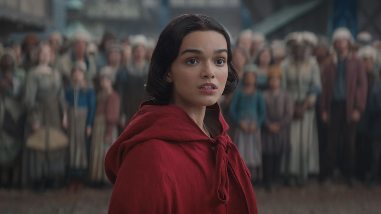 Snow White looking concerned in front of a crowd in "Snow White."