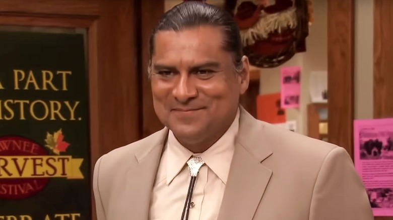 Ken in a beige suit in Parks and Recreation (2009)