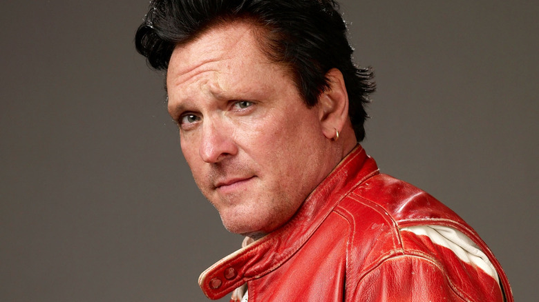 Michael Madson in a red leather jacket