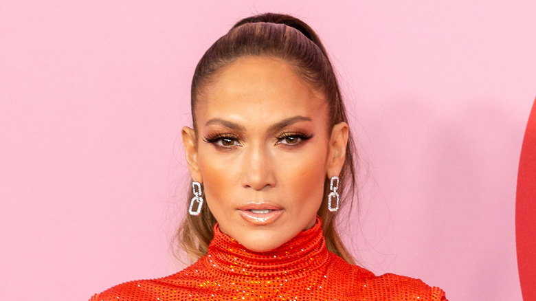 Jennifer Lopez wearing orange