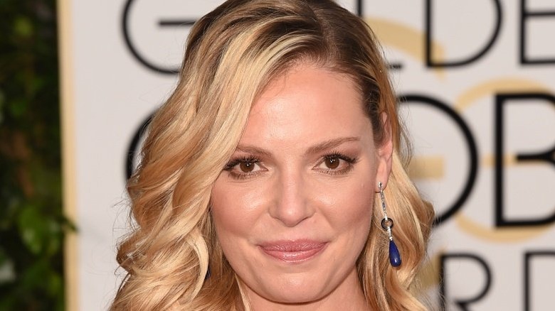 Katherine Heigl smiling at a press event