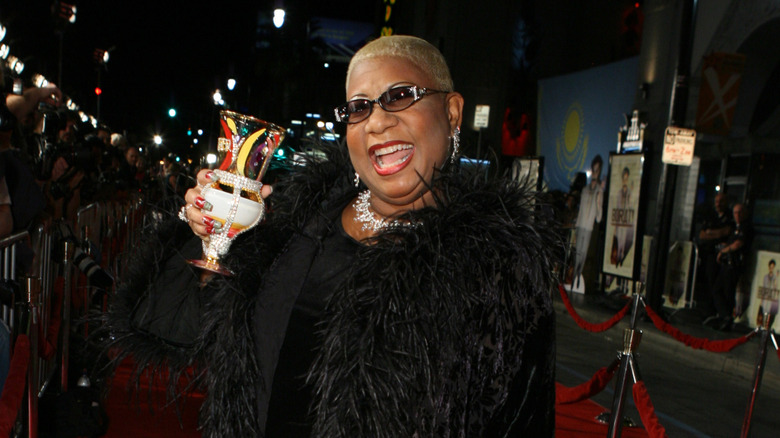 Luenell posing happily at world premiere of "Borat: Cultural Learnings of America for Make Benefit Glorious Nation of Kazakhstan"