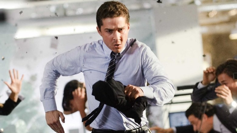 Sam Witwicky running from Transformers