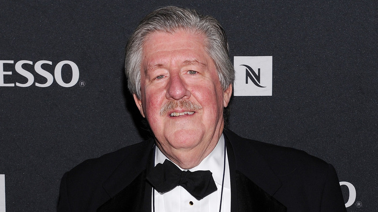 Edward Herrmann smiles