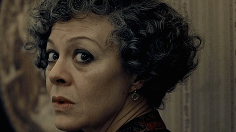 Helen McCrory looks over her shoulder