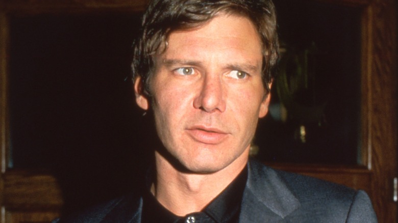 Harrison Ford in the 1980s looking uncomfortable