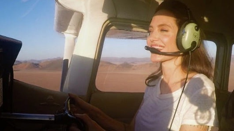 Jolie flies a plane
