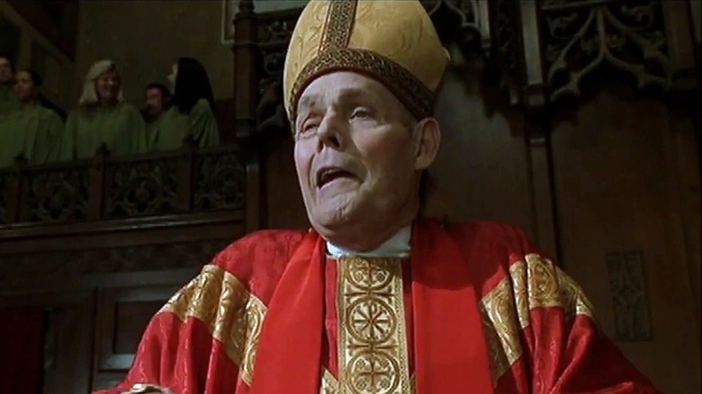 The cardinal smirks in "Little Nicky" (2000)