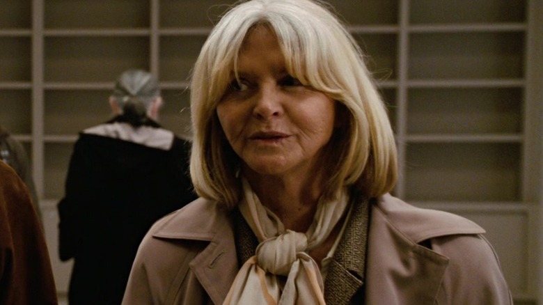 Ginger wears a scarf and overcoat in "Reign Over Me" (2007)