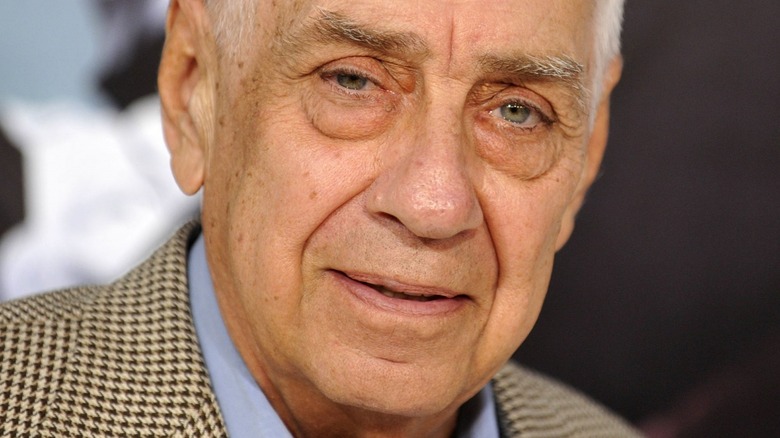Philip Baker Hall looks at the camera