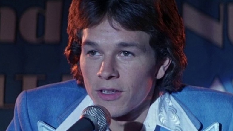Dirk Diggler accepting an award onstage