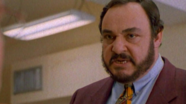 Professor Maximilian Arturo speaking in a classroom on Sliders
