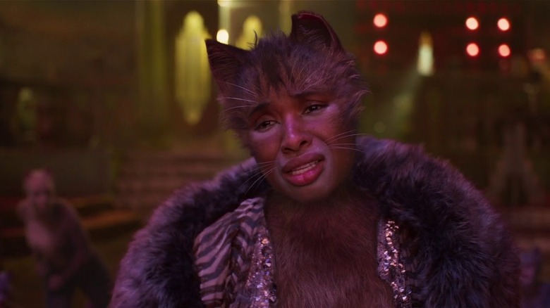 Grizabella tilts her head and cries