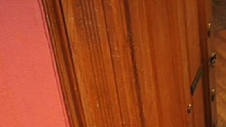 Margot Tenenbaum looking up from a doorway in The Royal Tenenbaums