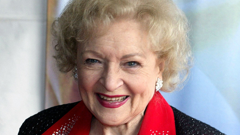 Betty White smiling black jacket