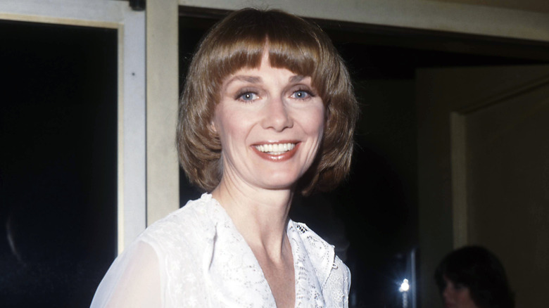Inga Swenson wearing white dress