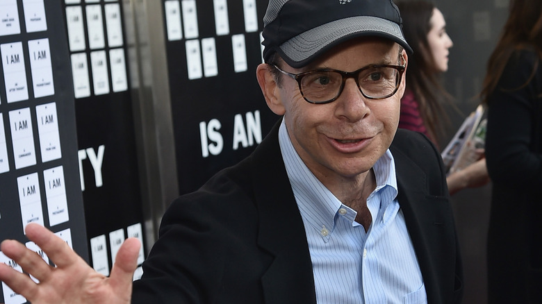 Rick Moranis waving