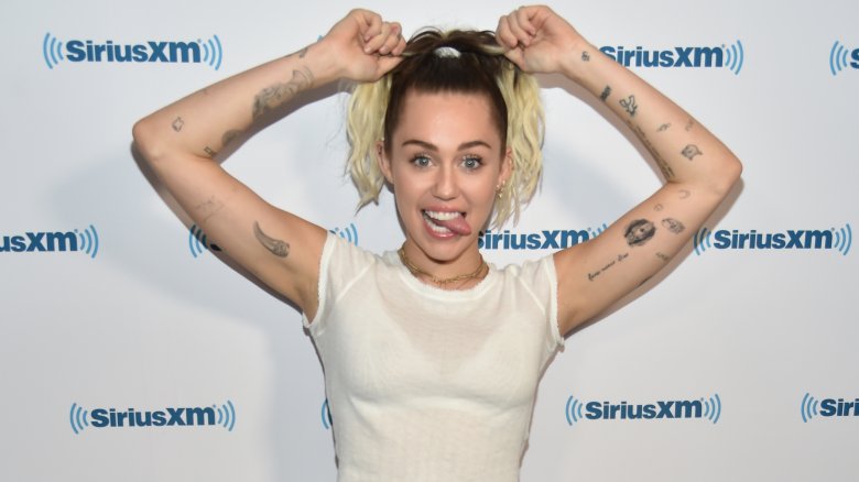 This image has an empty alt attribute; its file name is miley-cyrus-1495548854.jpg