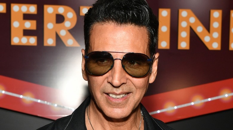 Aksay Kumar at a premiere wearing glasses