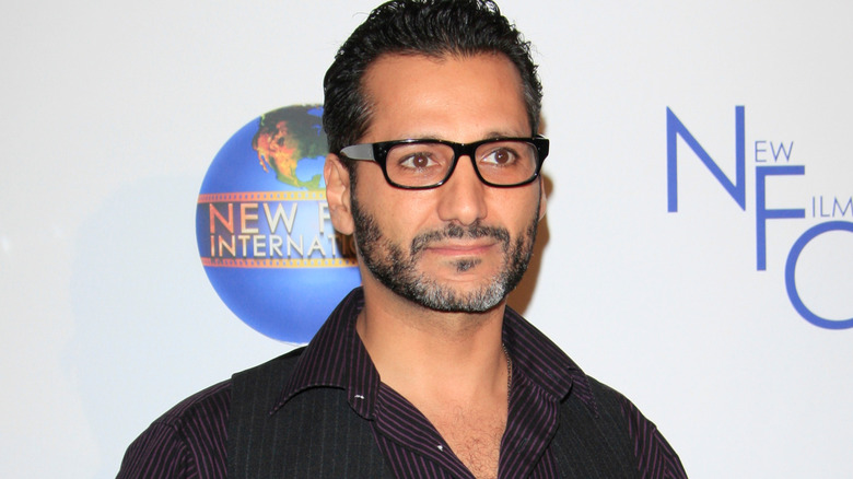 Cas Anvar posing for photographers