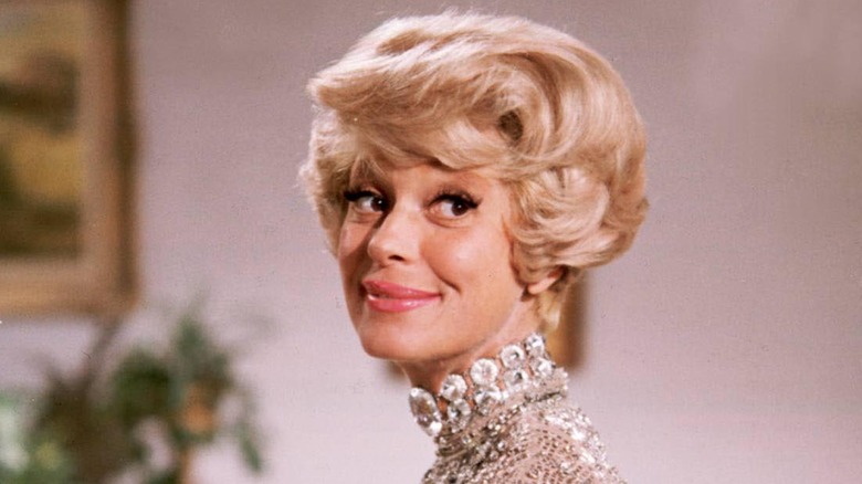 Carol Channing looks over her shoulder