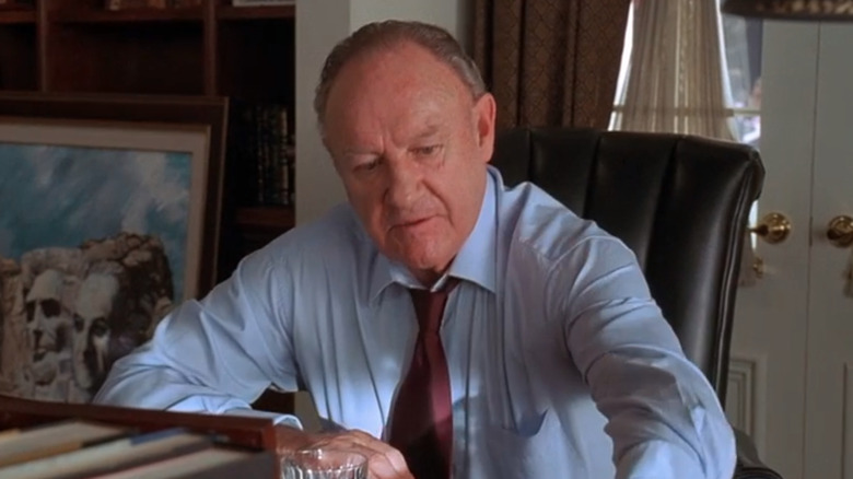 Cole sits at his desk