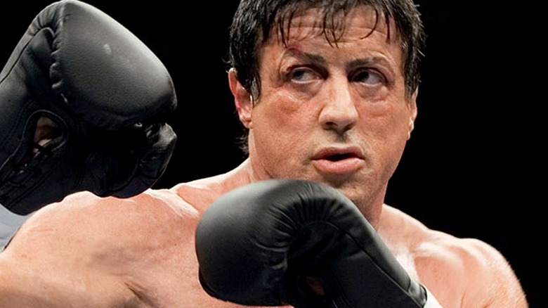 Rocky fighting with his gloves raised in "Rocky Balboa"