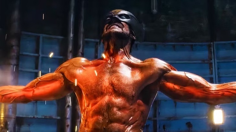 A shirtless Wolverine flexes in "Deadpool & Wolverine"