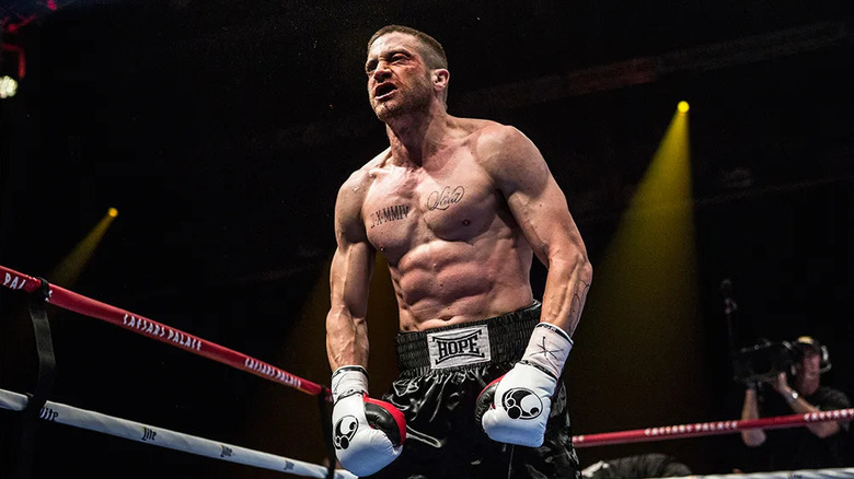 Billy Hope flexes in ring