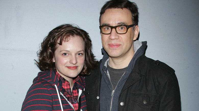 Elisabeth Moss and Fred Armisen smiling together