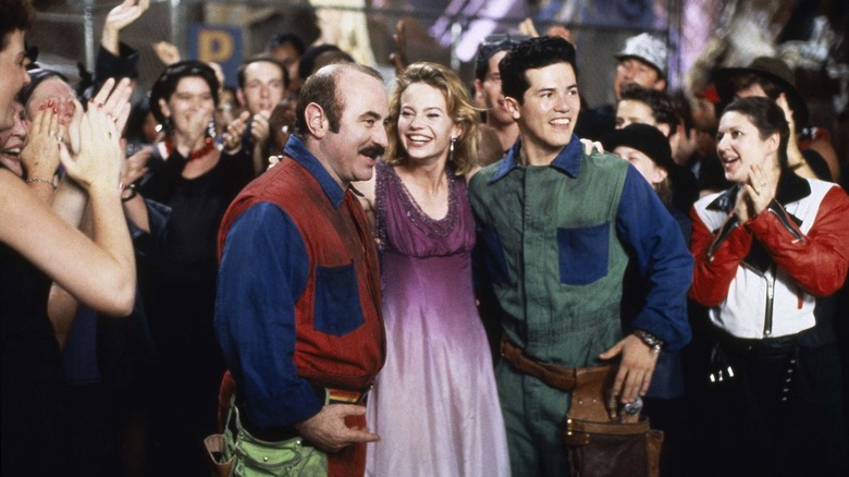 Mario, Daisy, and Luigi celebrate in "Super Mario Bros." (1993)
