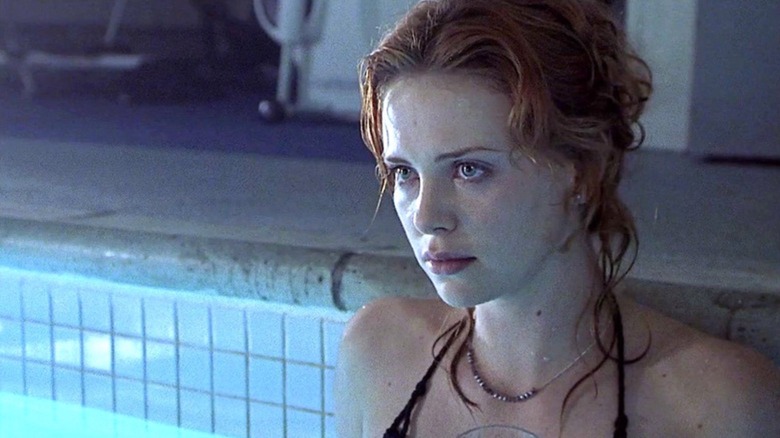 Ashley Mercer in the pool in "Reindeer Games" (2000)
