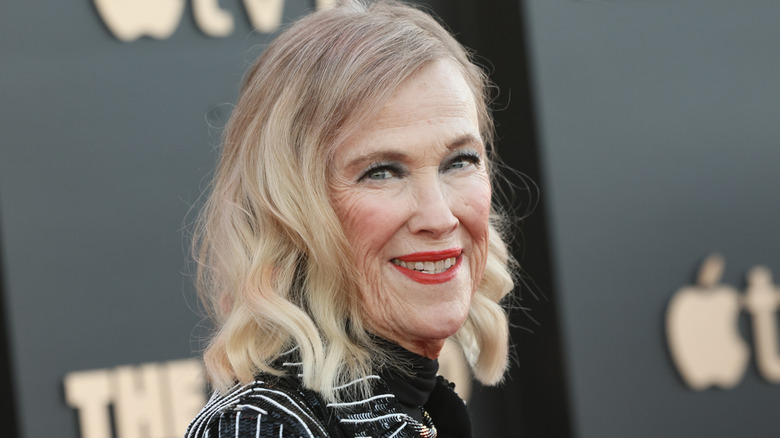 Catherine O'Hara smiling and turned to her right