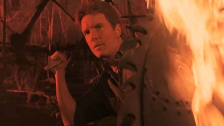 Johnny Cage holding spear and flaming shield