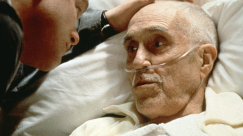 Earl Partridge being comforted in his deathbed in "Magnolia" (1999)