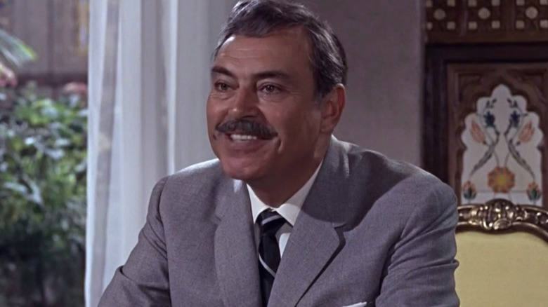 Ali Kerim Bey smiling while sitting in "From Russia with Love" (1963)