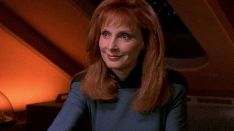Dr. Crusher smiling