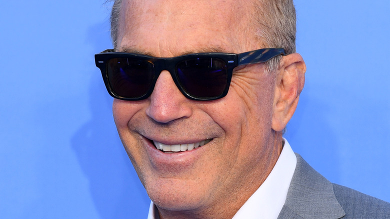 Kevin Costner smiling sunglasses